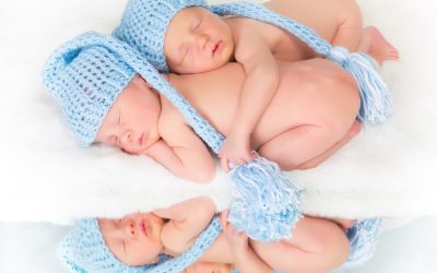 12 hands, 12 feet and 1 house!  Infant massage and quadruplets
