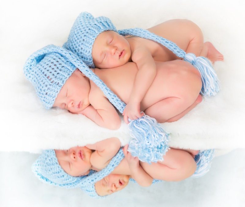 12 hands, 12 feet and 1 house!  Infant massage and quadruplets